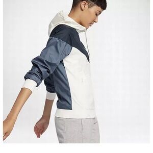 Nike womens Windrunner jacket in navy, white and light blue colorway